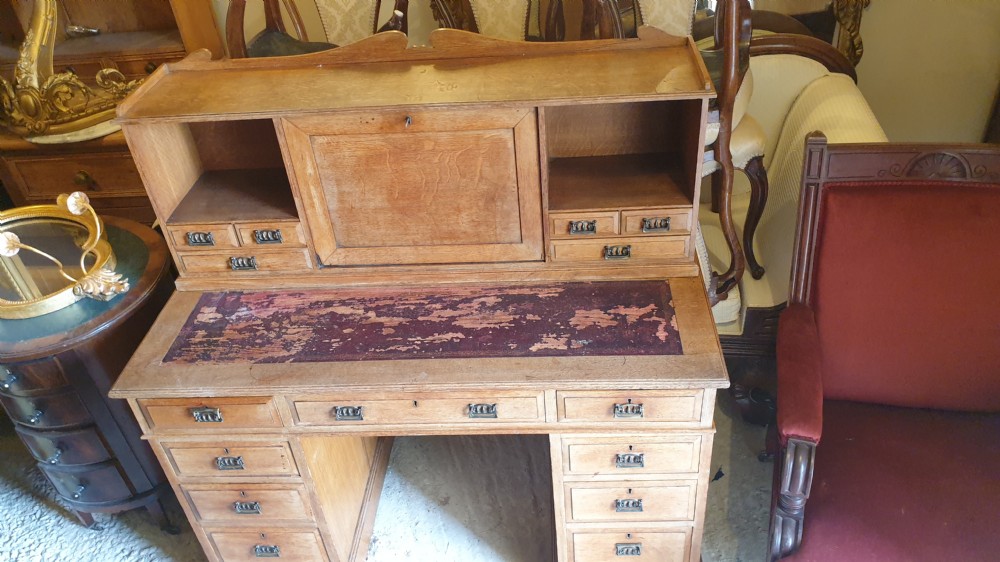 Oak Arts and crafts kneehole pedestal desk.  View VI