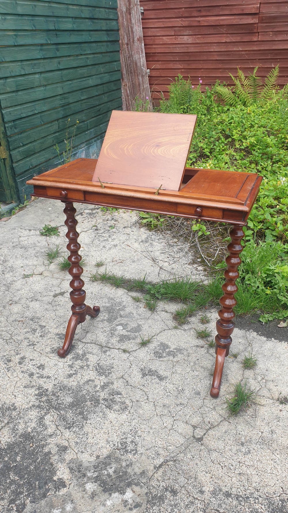 Victorian mahogany reading table with original makers label. 