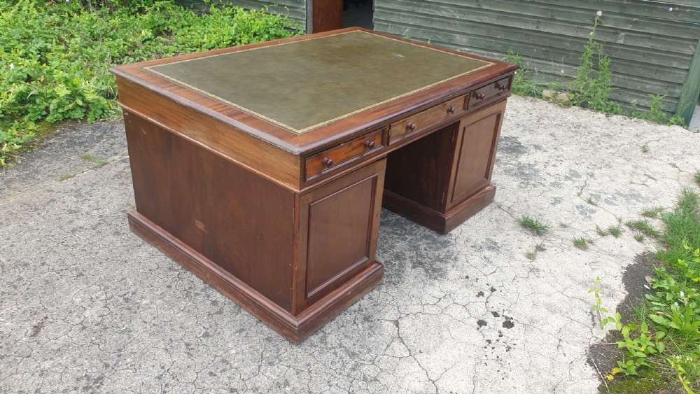 Victorian mahogany pedestal partners desk. Makers stamp. View II