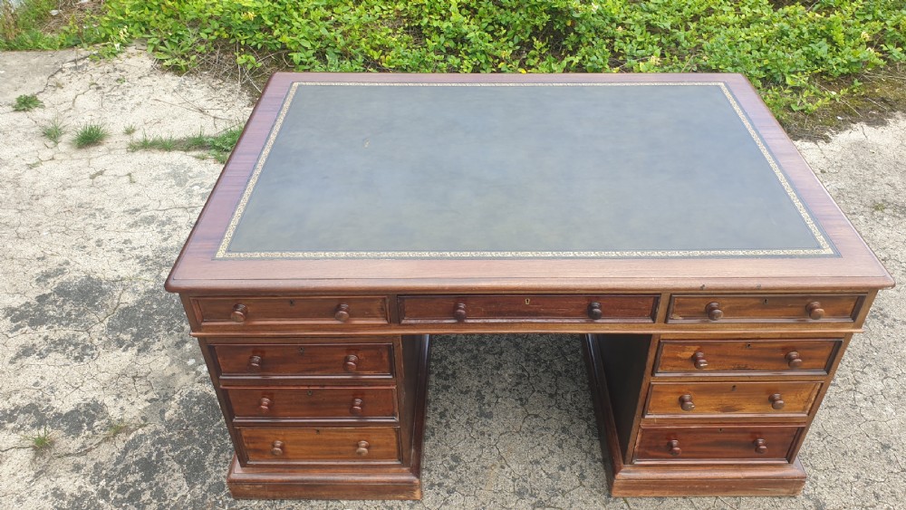 Victorian mahogany pedestal partners desk. Makers stamp. View V