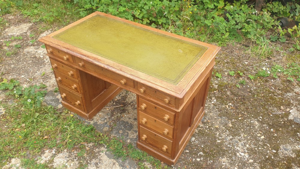 Edwardian pitch pine pedestal desk. 