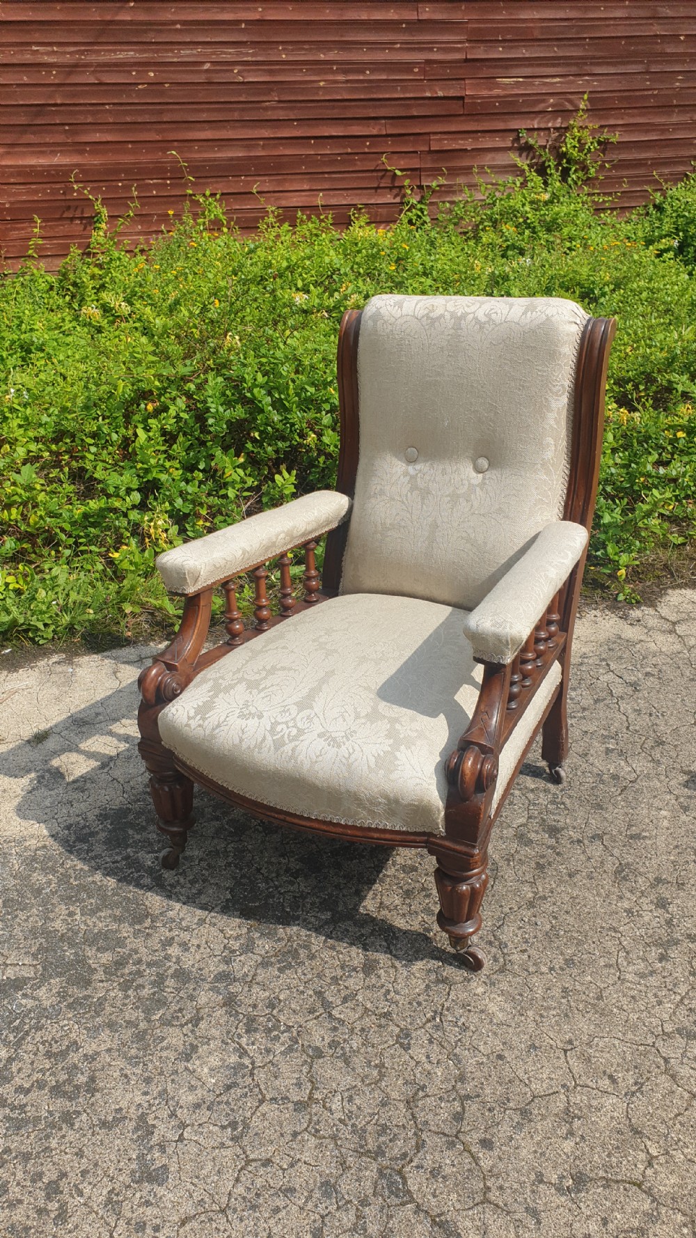 Victorian mahogany framed upholstered library armchair.  View III