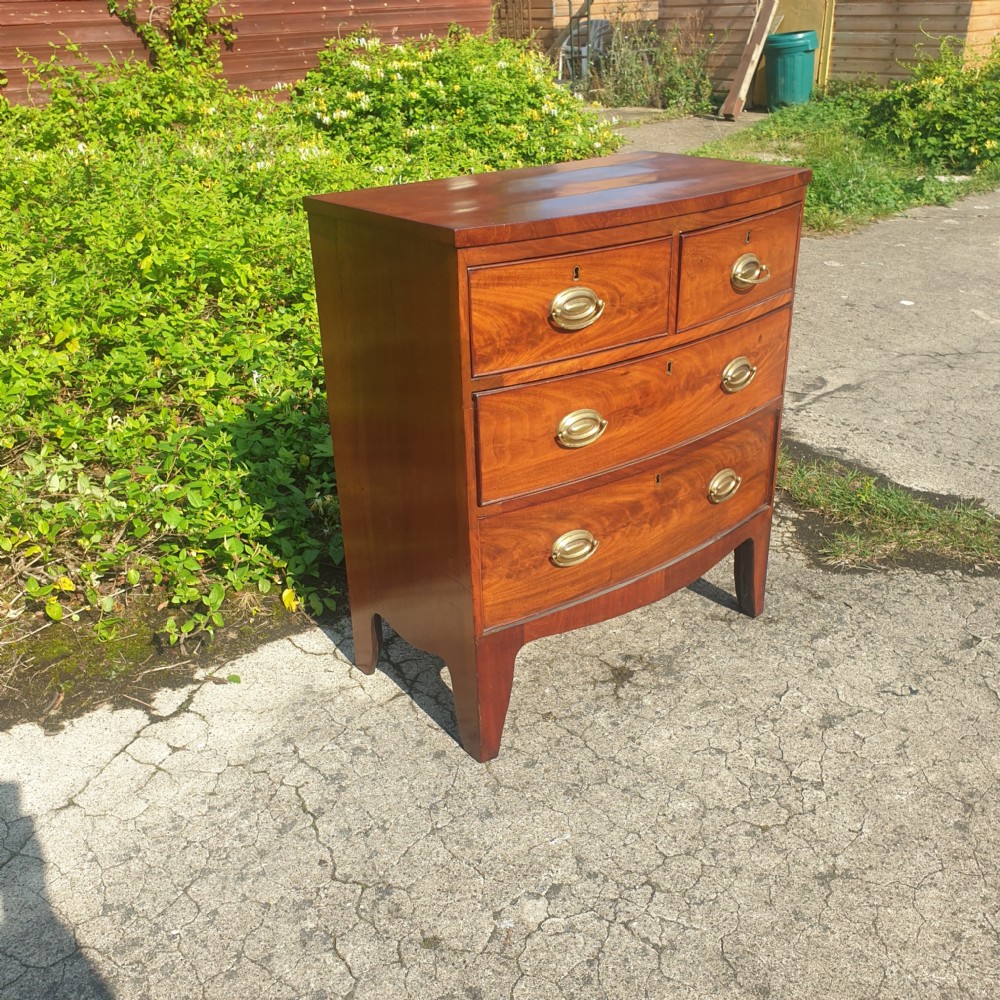 Small 19th century mahogany bow front chest. View II