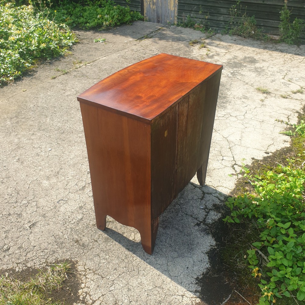 Small 19th century mahogany bow front chest. View IV