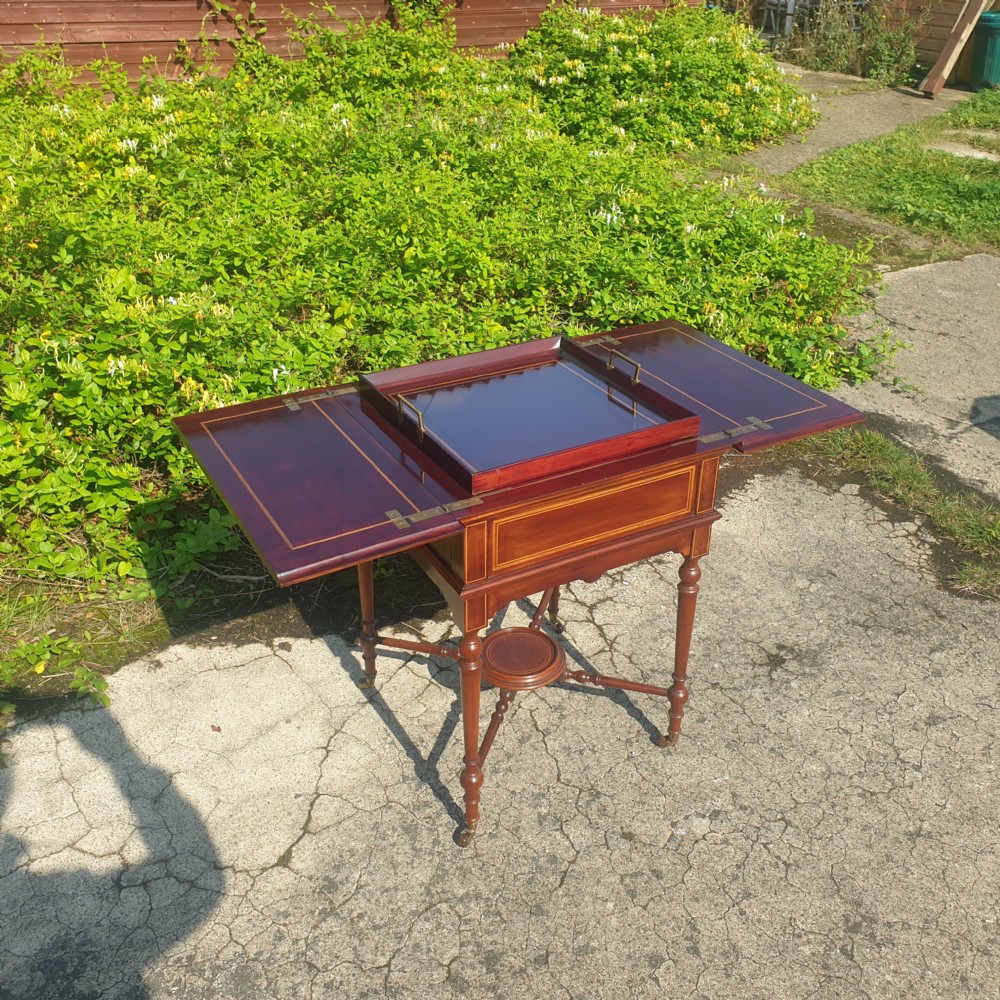 Good quality inlaid mahogany surprise drinks table with tray.  View V