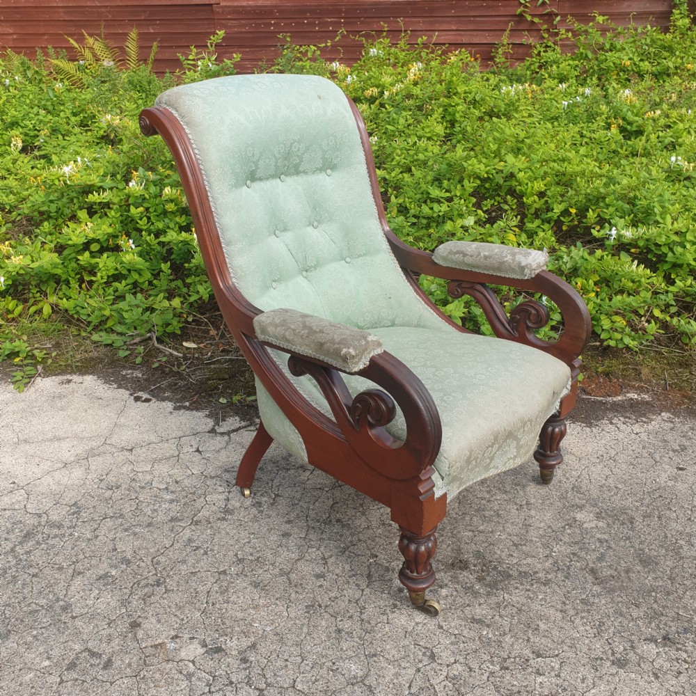 Early Victorian mahogany scroll arm library armchair 