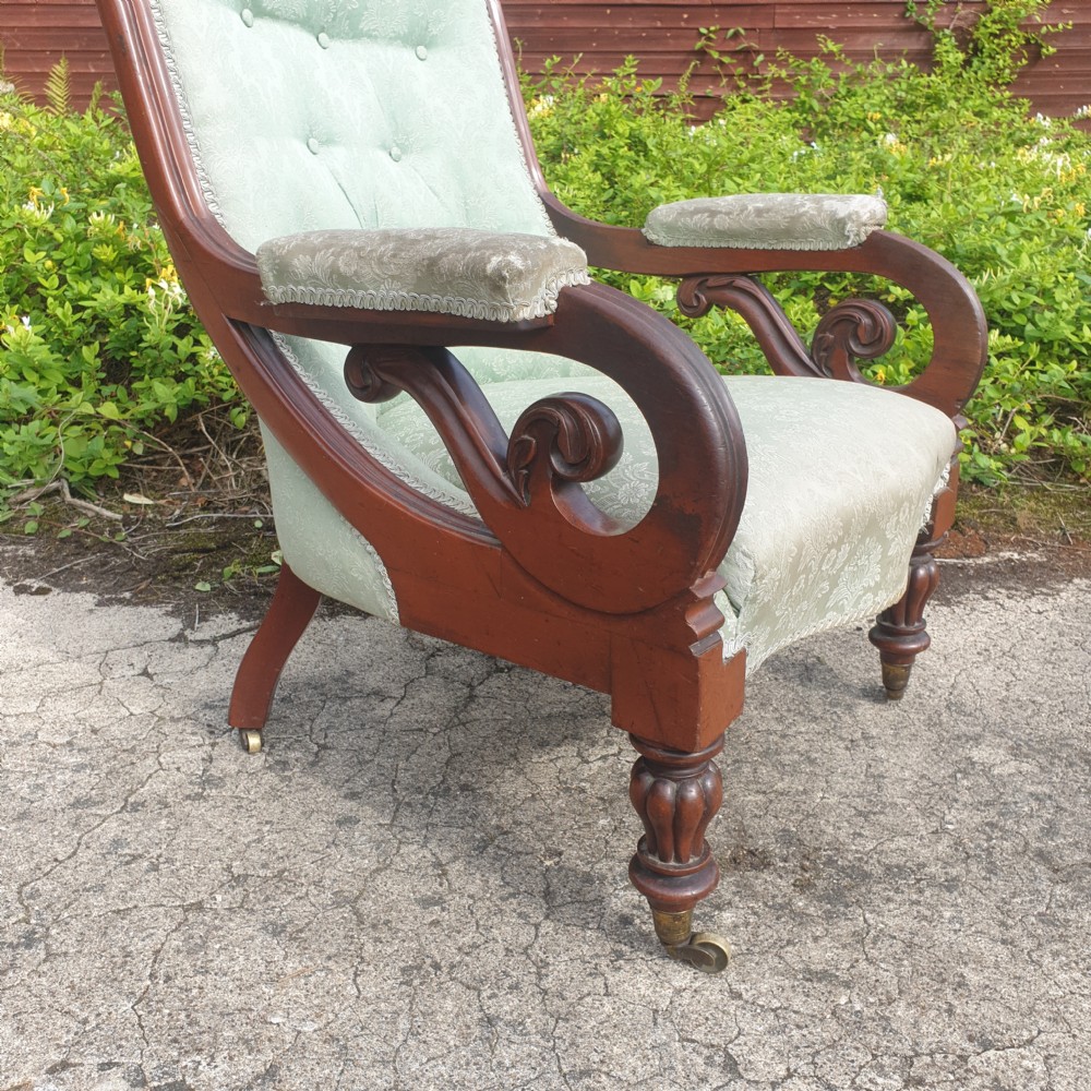 Early Victorian mahogany scroll arm library armchair  View II