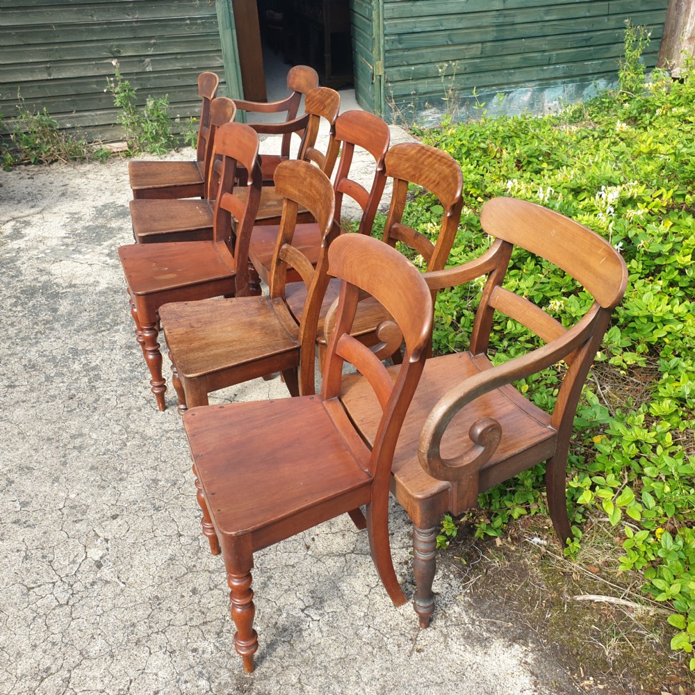 Set of 10 (close harlequin) 19th century farmhouse dining chairs.  View II