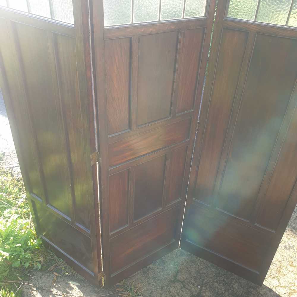 Edwardian panelled oak screen with painted decoration.  View III