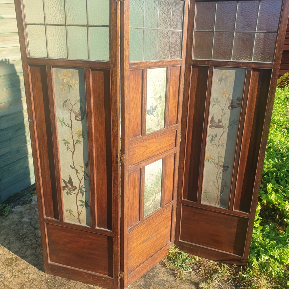 Edwardian panelled oak screen with painted decoration.  View V