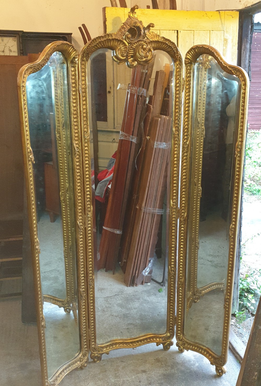 Carved giltwood framed triple dressing mirror. 