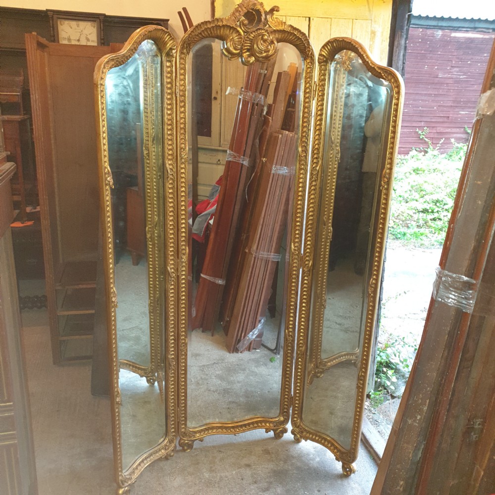 Carved giltwood framed triple dressing mirror.  View II