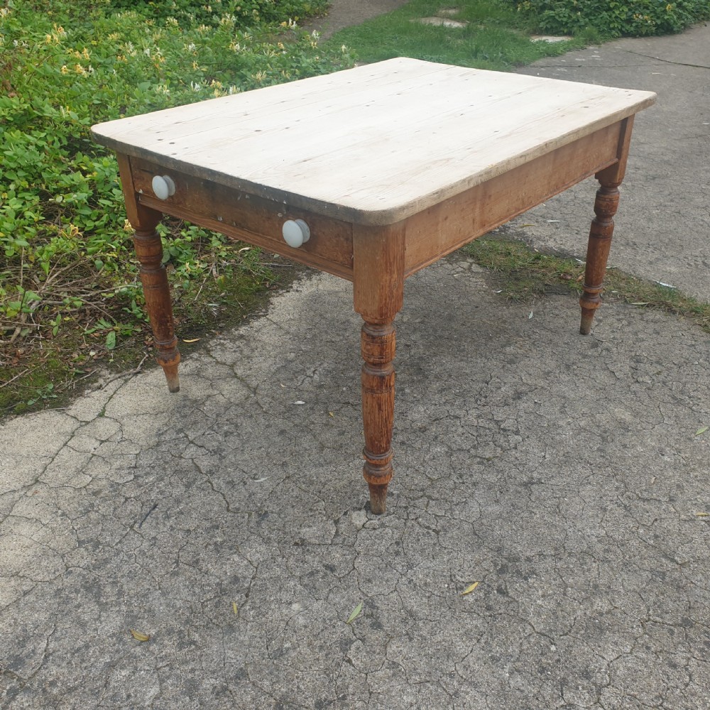 Late Victorian scrubbed top pine kitchen table.  View III