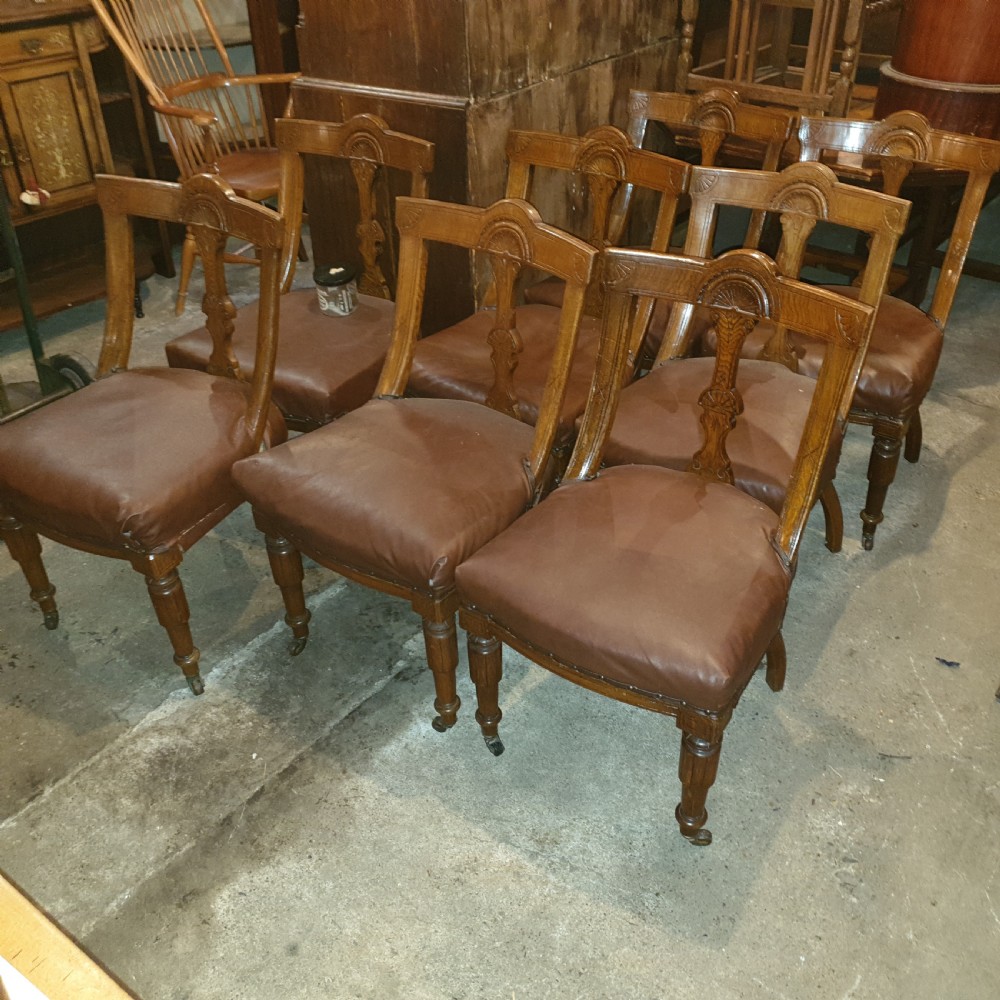 Set of 8 late Victorian oak dining chairs.  View II
