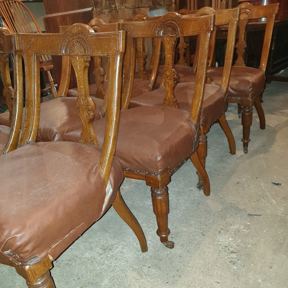 Set of 8 late Victorian oak dining chairs.  View III