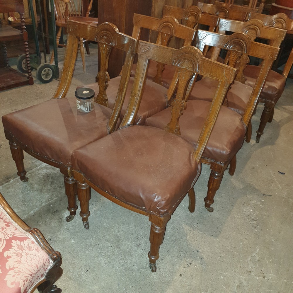 Set of 8 late Victorian oak dining chairs.  View IV