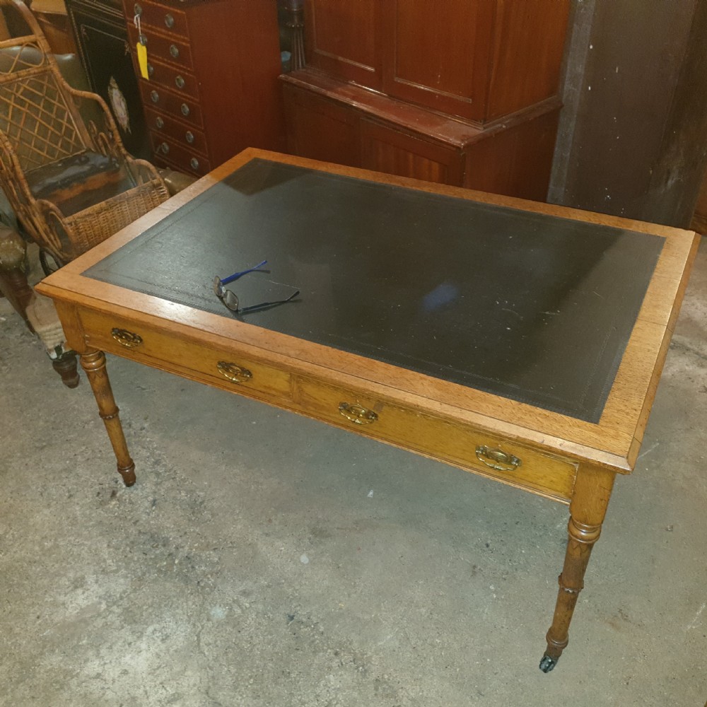 Large late Victorian oak writing table 