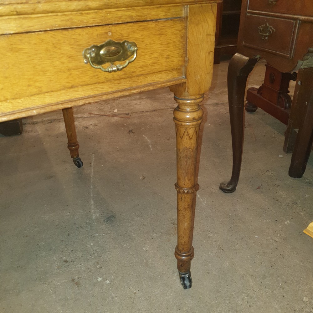 Large late Victorian oak writing table  View III