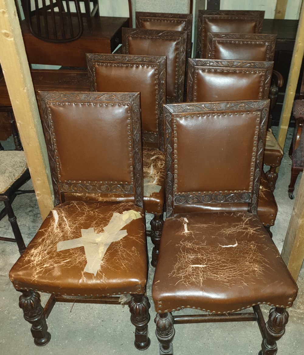 Set of 8 carved oak dining chairs 