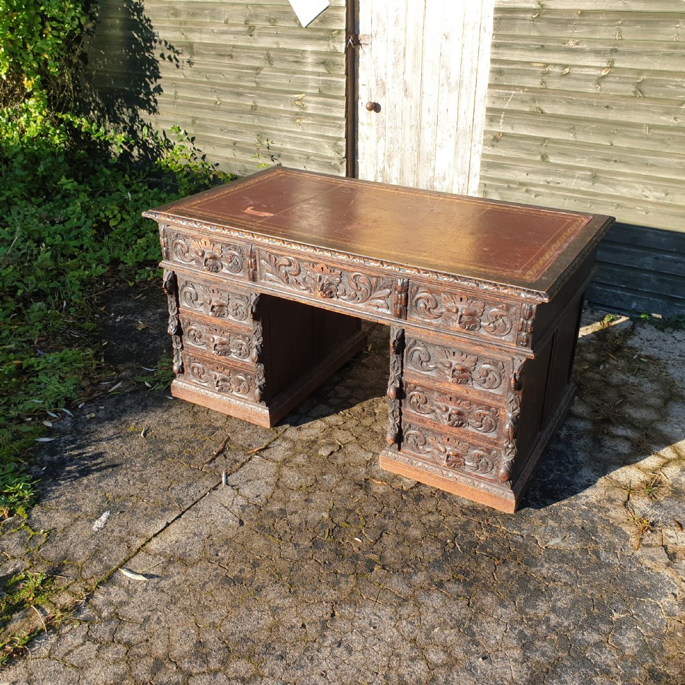 Victorian carved oak Green Man pedestal desk  View II