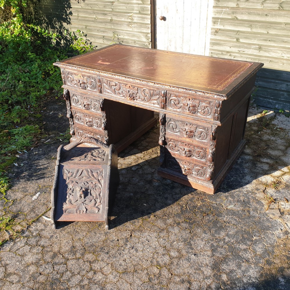 Victorian carved oak Green Man pedestal desk  View V