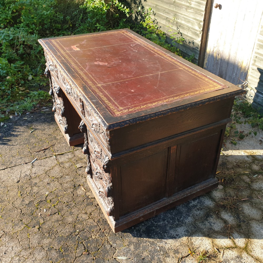 Victorian carved oak Green Man pedestal desk  View VI