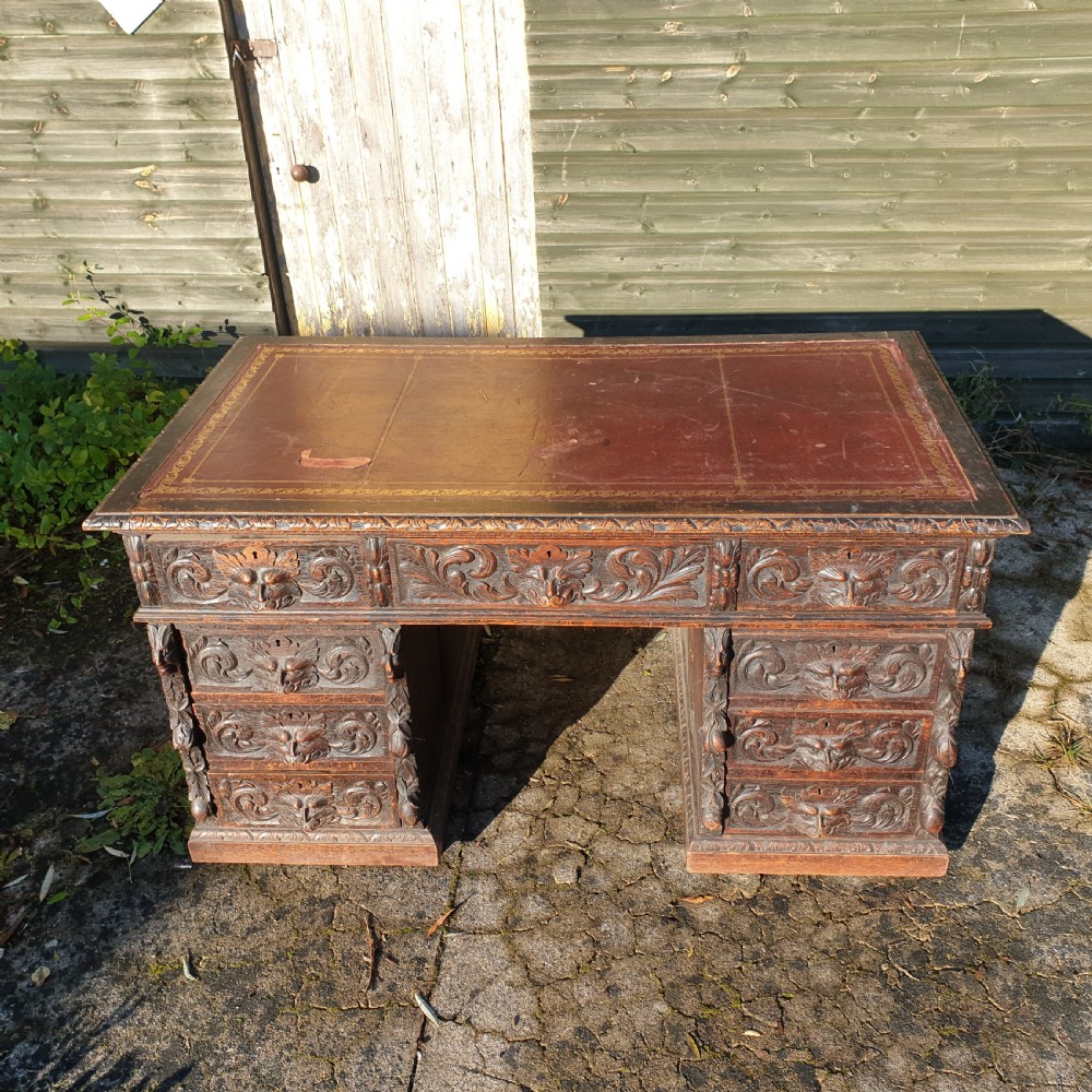 Victorian carved oak Green Man pedestal desk  View VII