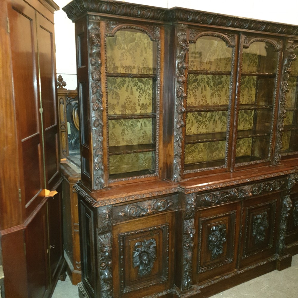 Good Victorian carved oak Green Man breakfront bookcase.  View X