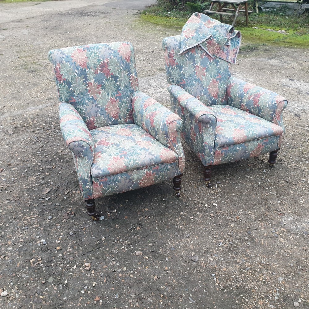 Pair of deep seated upholstered armchairs. 