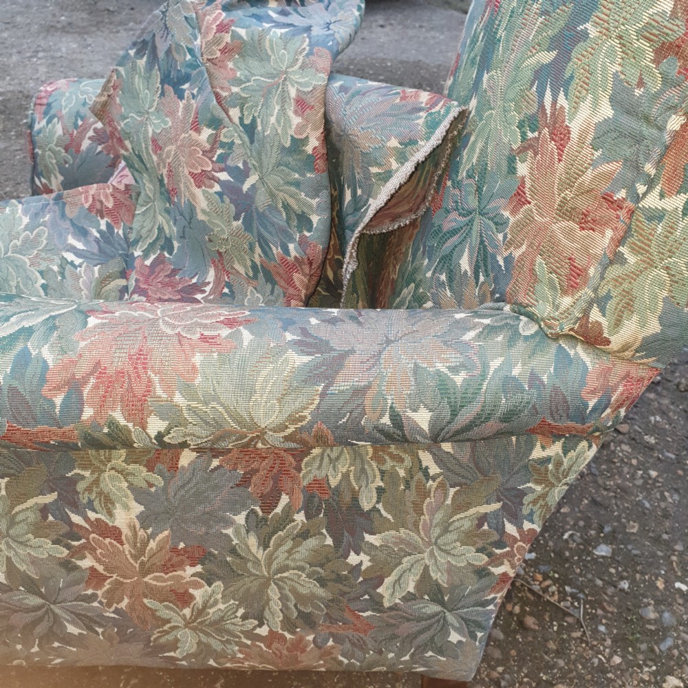 Pair of deep seated upholstered armchairs.  View II
