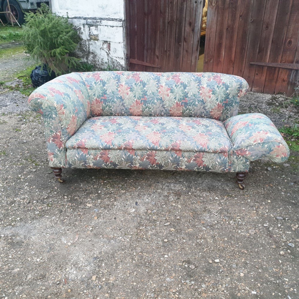 Edwardian upholstered Chesterfield sofa with drop arm. View II