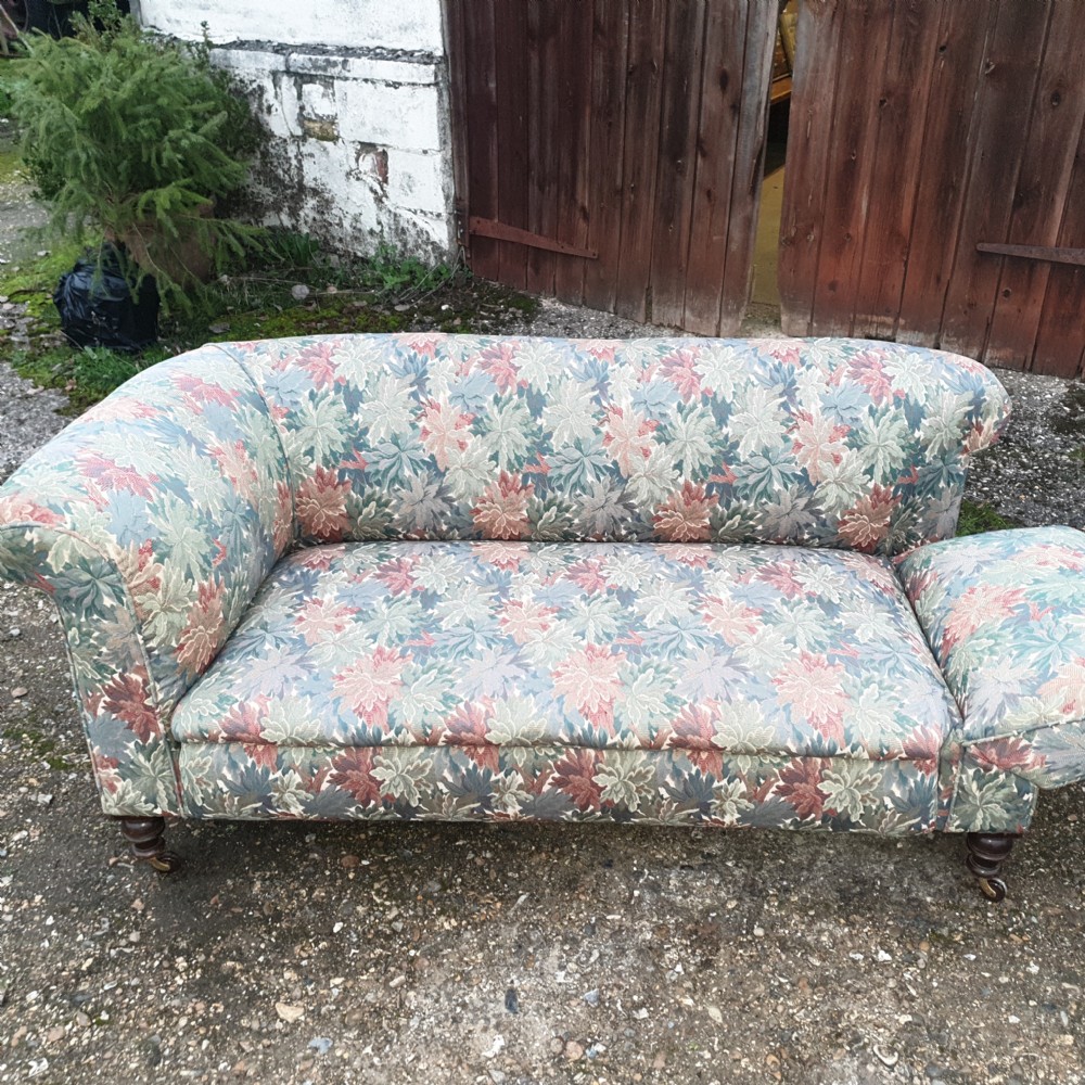 Edwardian upholstered Chesterfield sofa with drop arm. View VIII