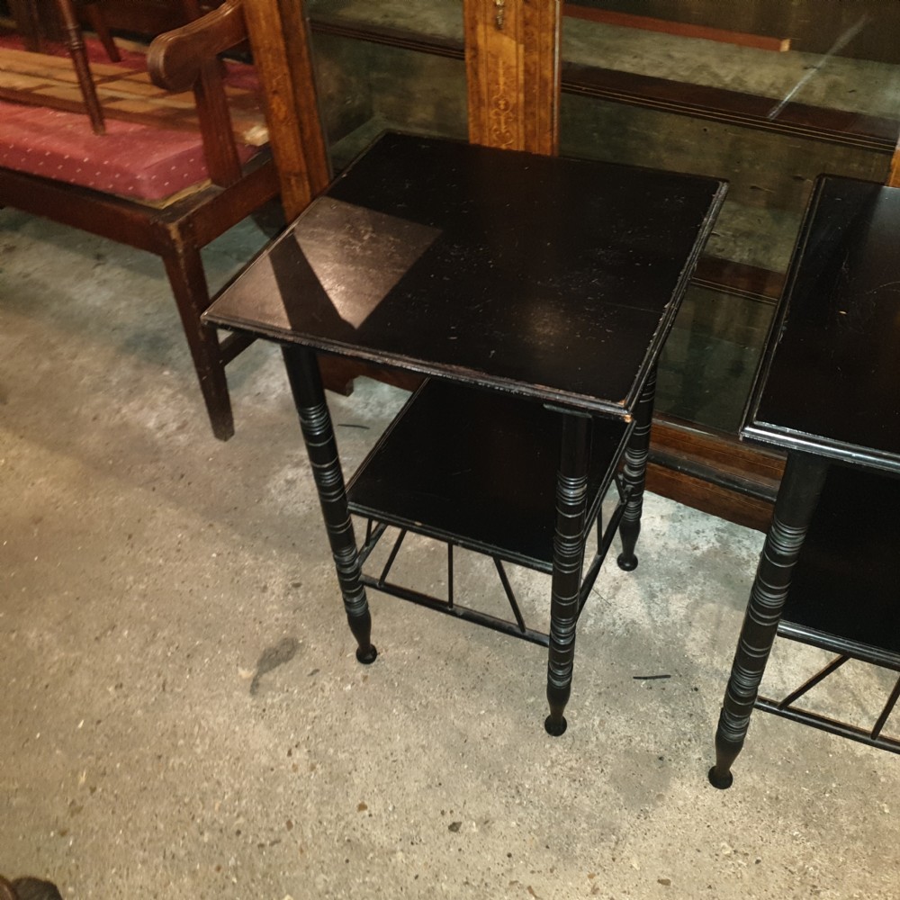 Close pair of ebonised occasional tables in the of E W Godwin.  View VIII