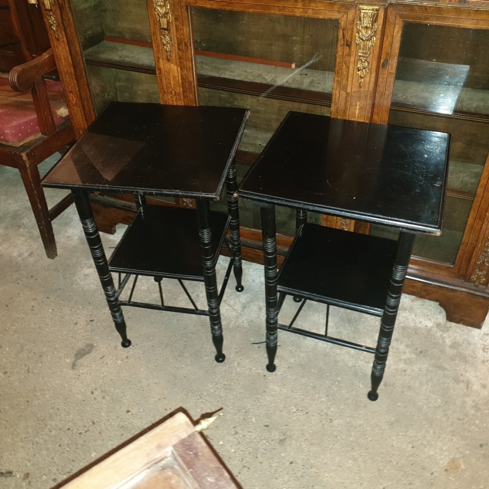 Close pair of ebonised occasional tables in the of E W Godwin.  View IX
