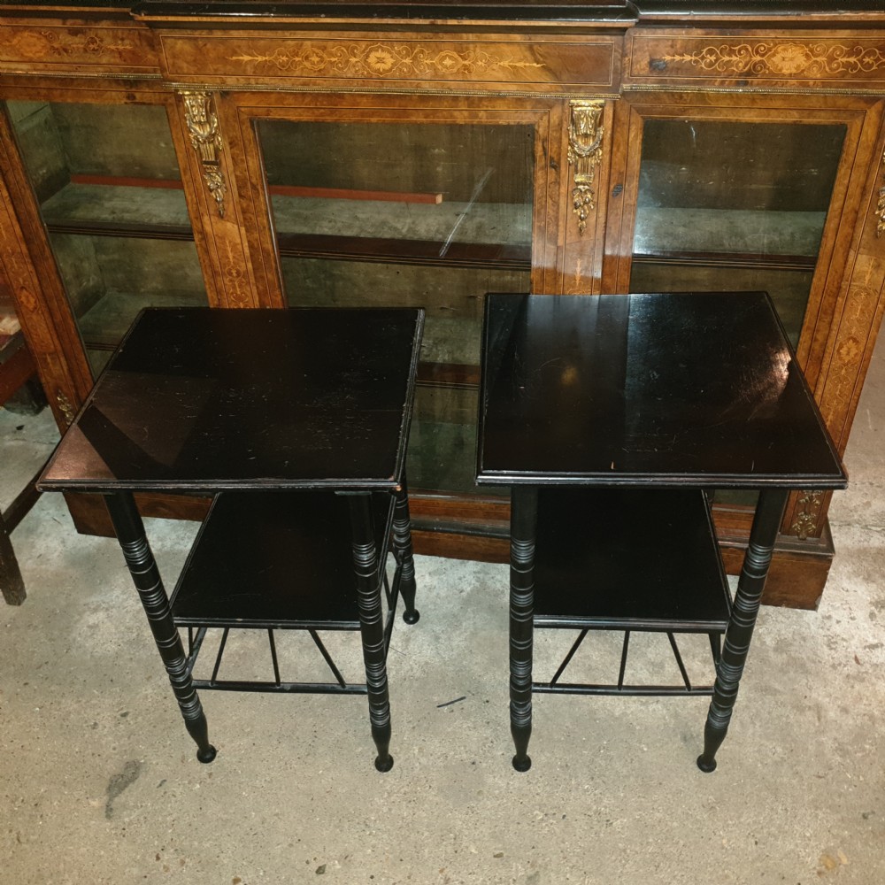 Close pair of ebonised occasional tables in the of E W Godwin.  View X
