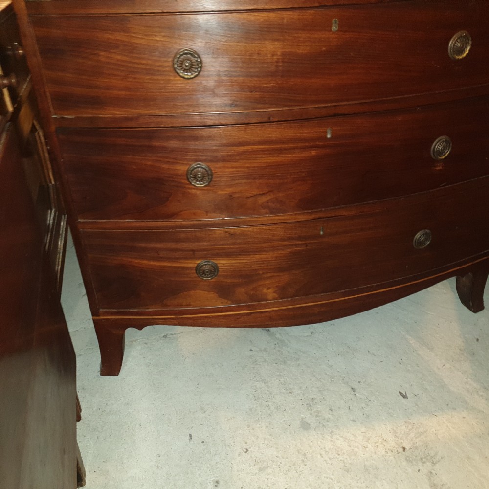 Late Georgian mahogany bow front chest of drawers.  View III