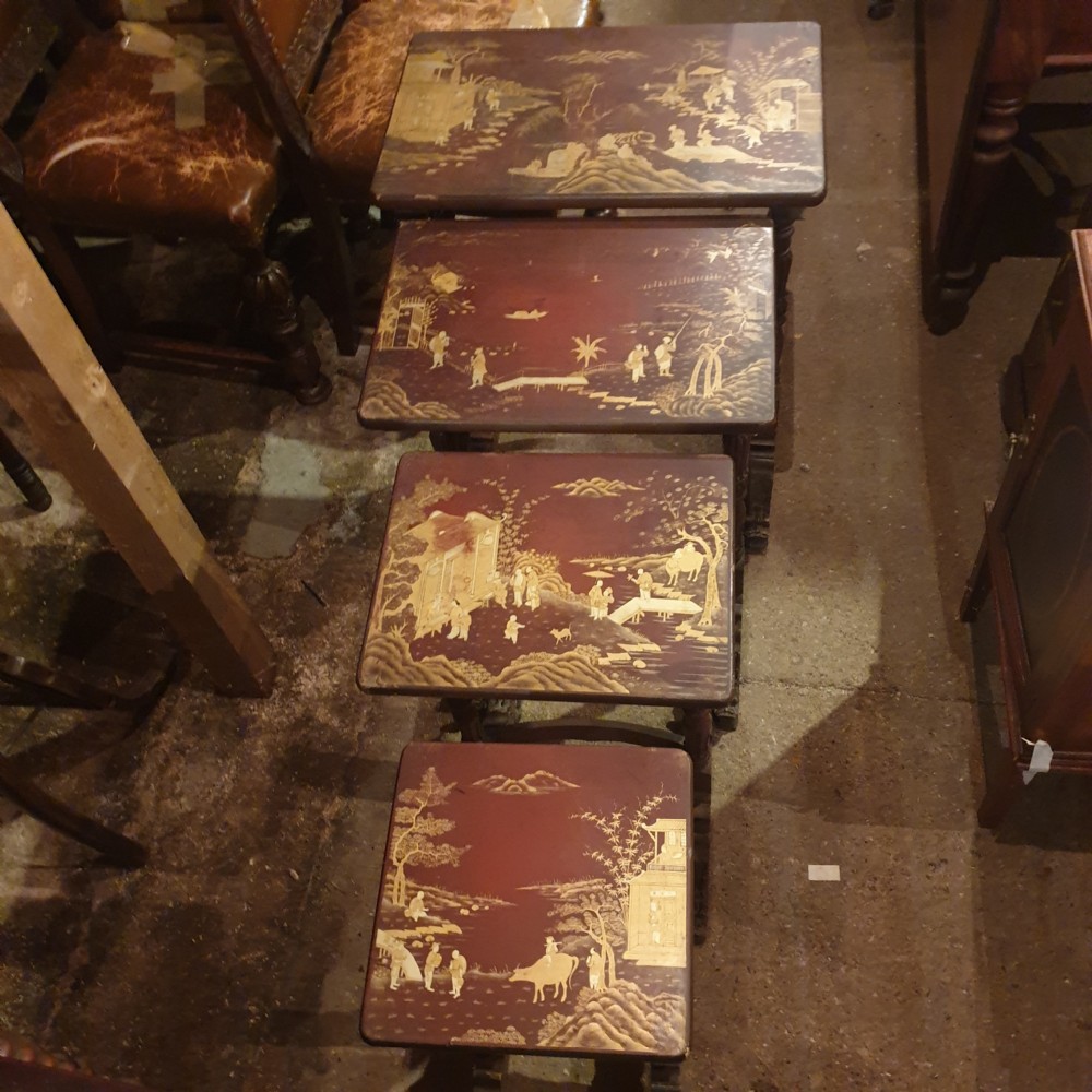 Nest of 4 lacquered tables  View VII