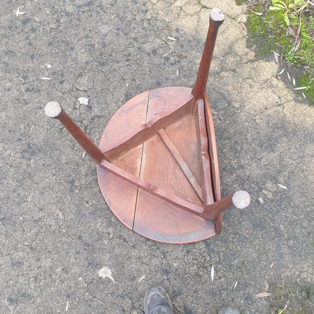 Rare mid 18th century elm drop flap cricket table.  View IV
