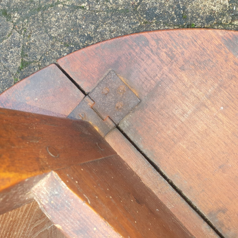 Rare mid 18th century elm drop flap cricket table.  View VI