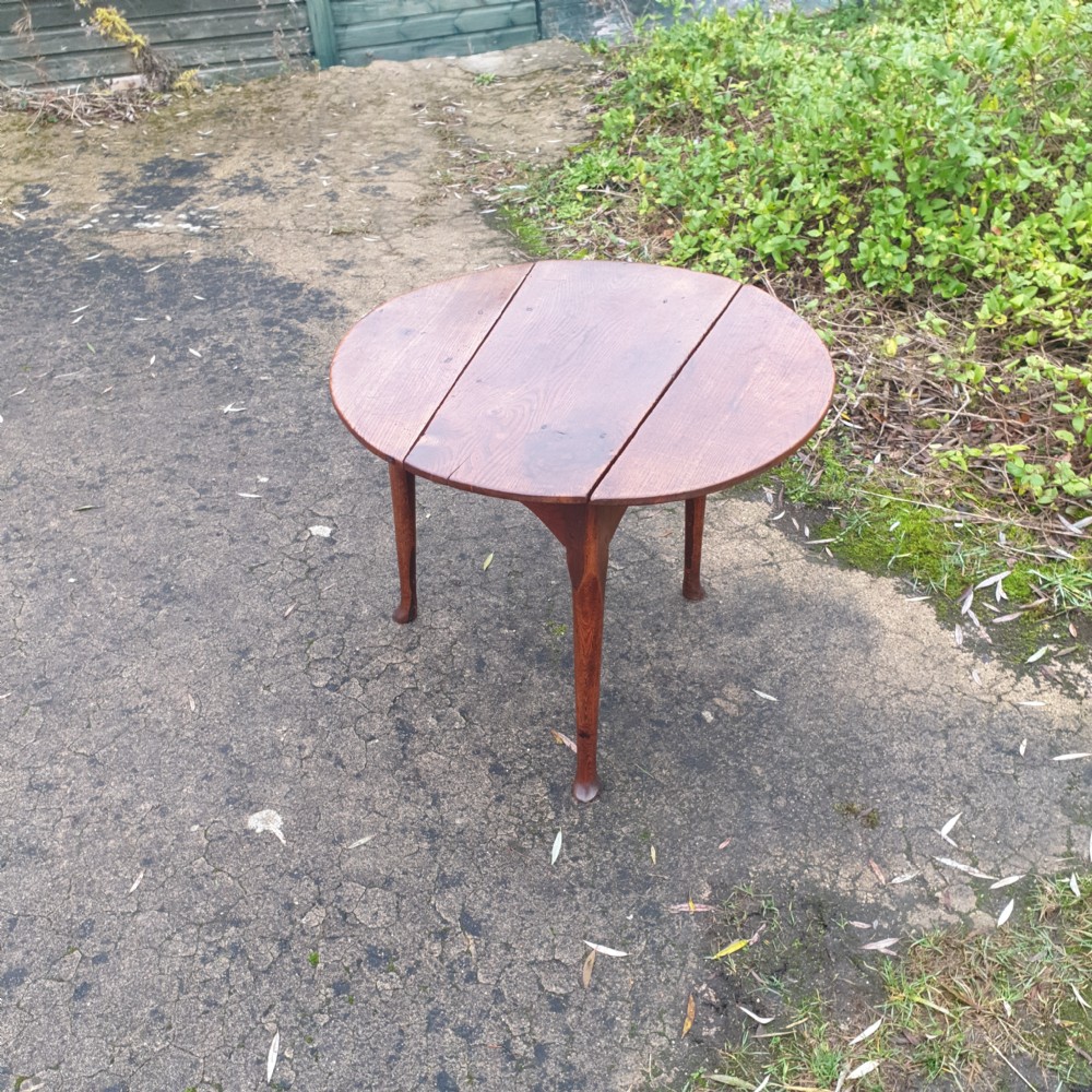 Rare mid 18th century elm drop flap cricket table.  View IX