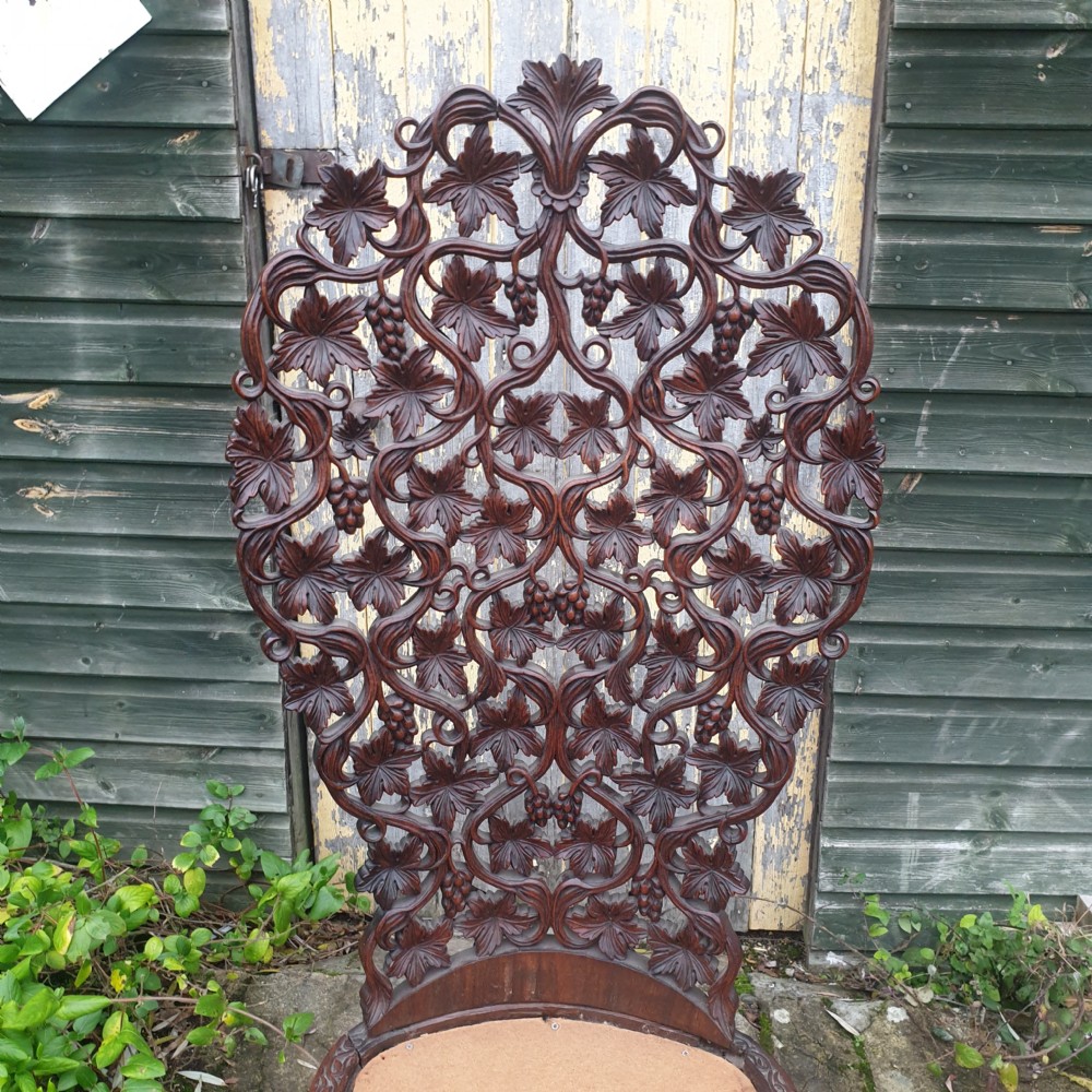 Ornate carved Burmese high back chair View III
