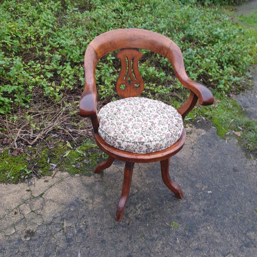 Victorian oak cane seat revolving desk armchair  View IV