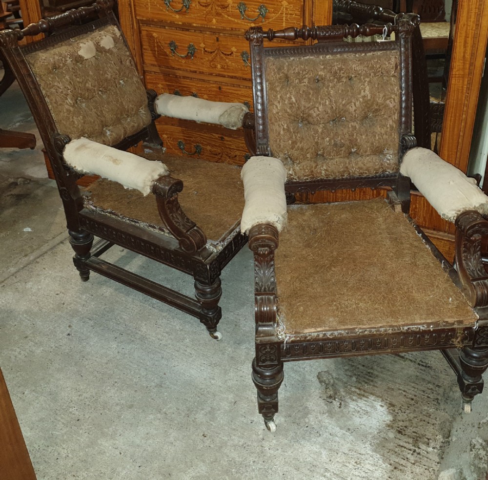 Pair of Victorian carved walnut library armchairs. 