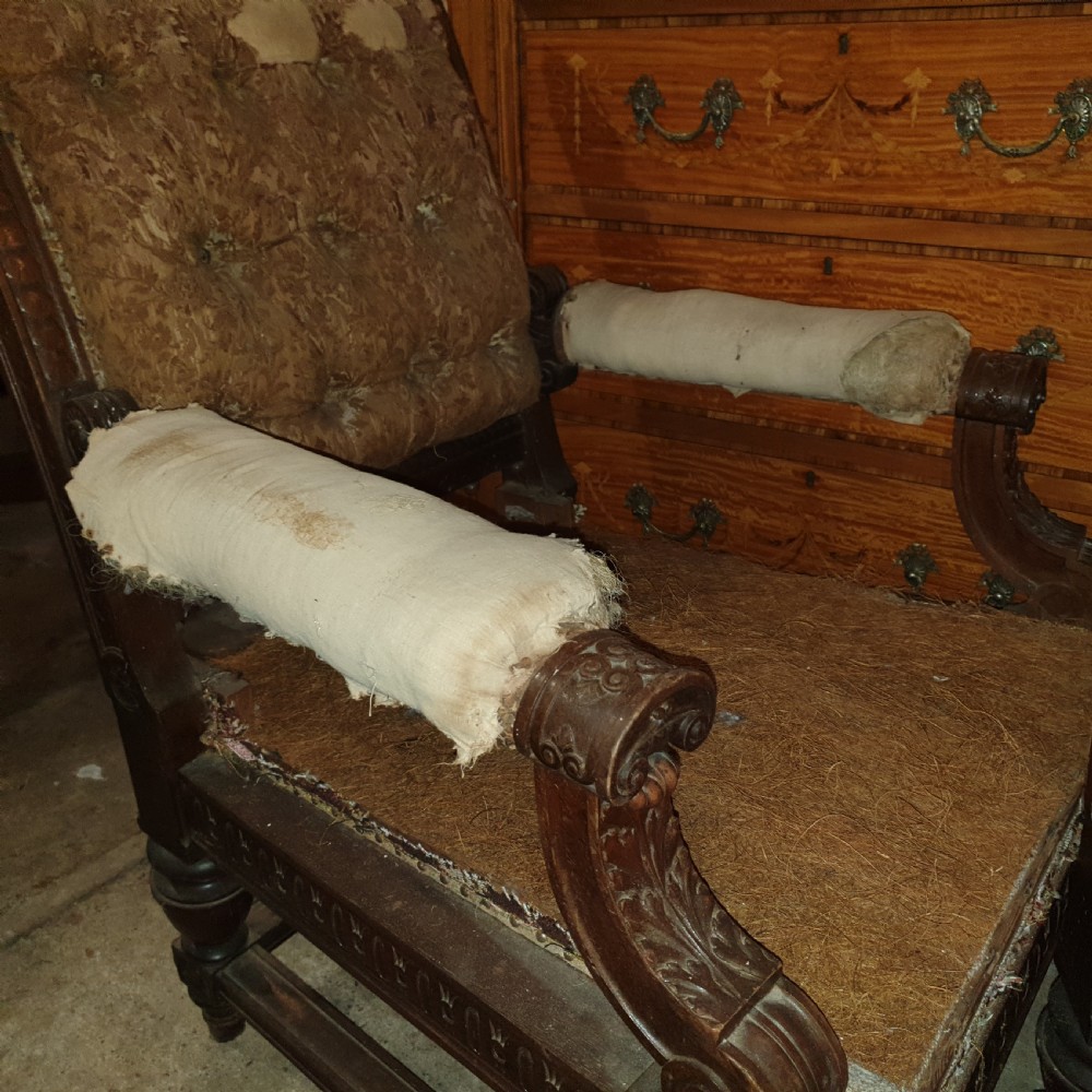 Pair of Victorian carved walnut library armchairs.  View IV