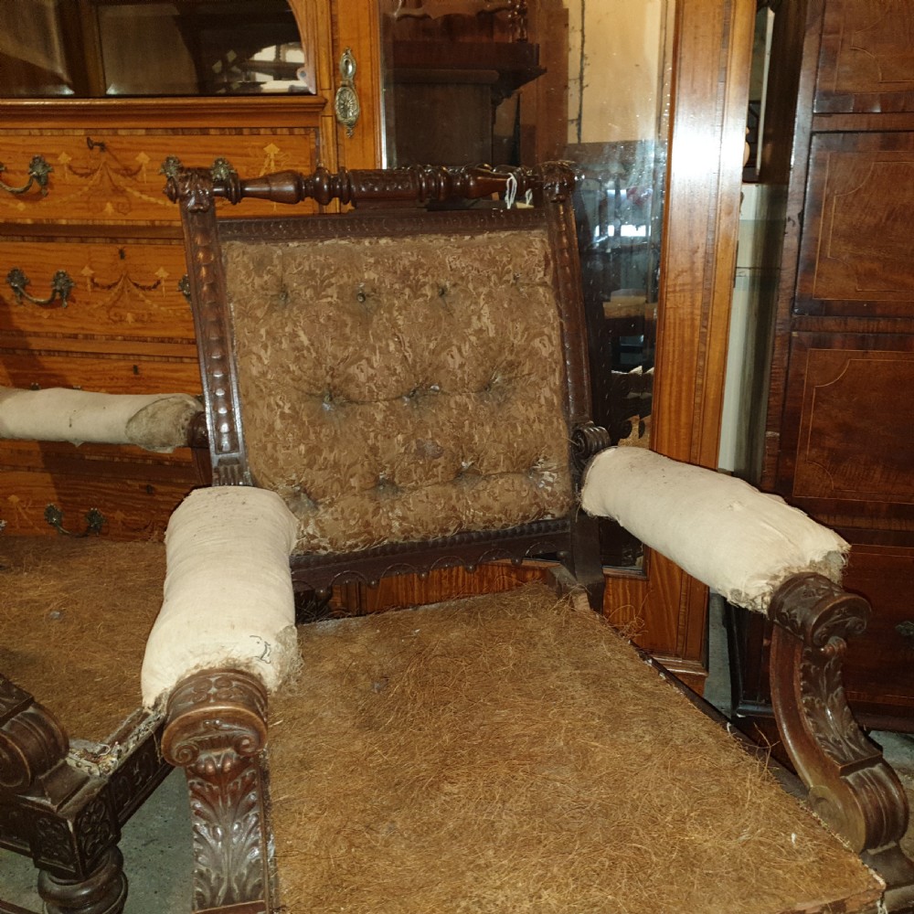 Pair of Victorian carved walnut library armchairs.  View VI