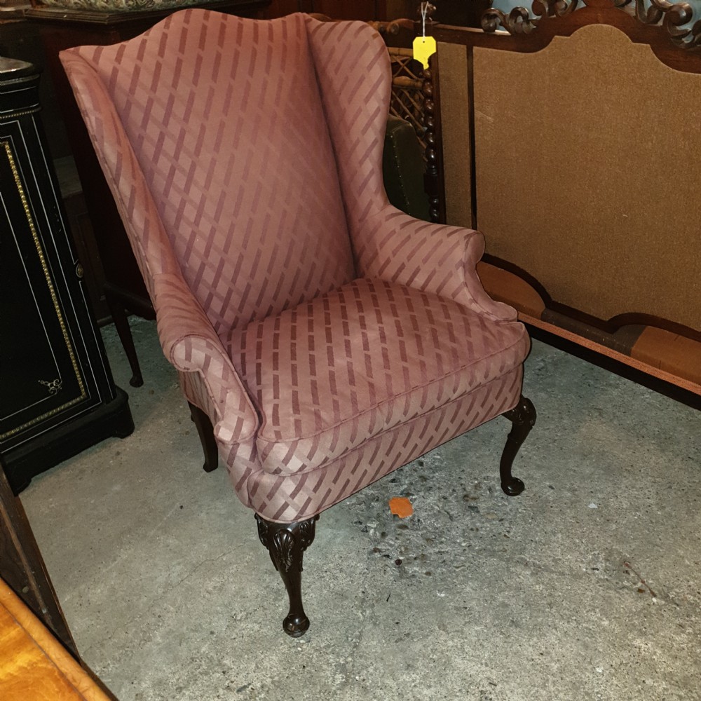 Mahogany frame wing back upholstered armchair. 