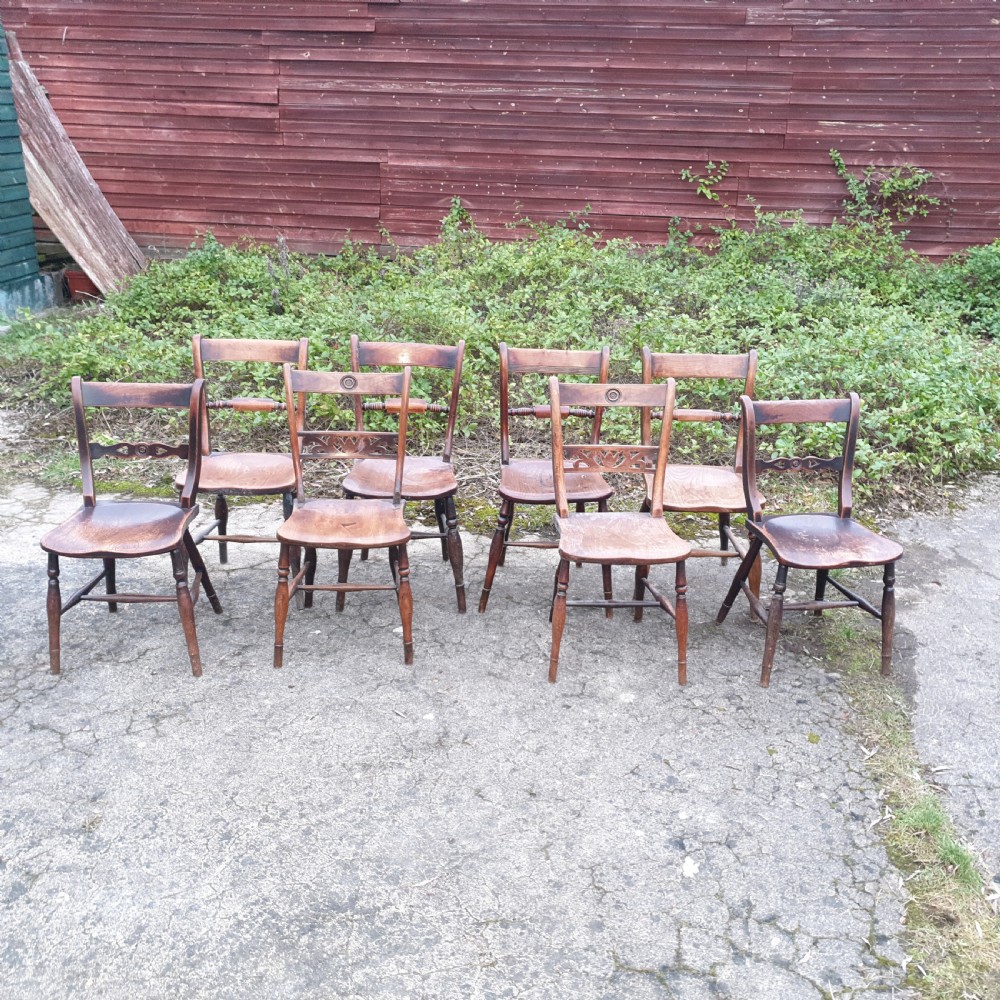 Harlequin set of 8 19th century Windsor farmhouse kitchen chairs. View II