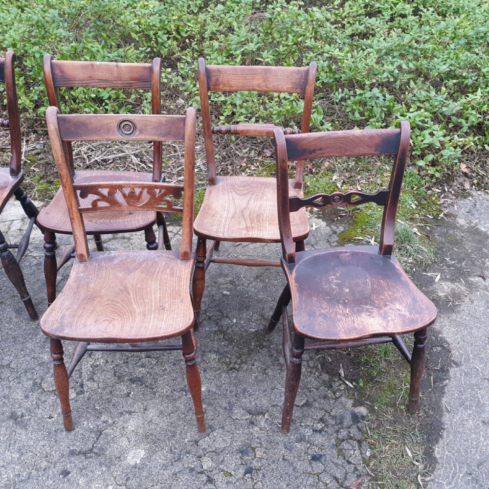 Harlequin set of 8 19th century Windsor farmhouse kitchen chairs. View IV