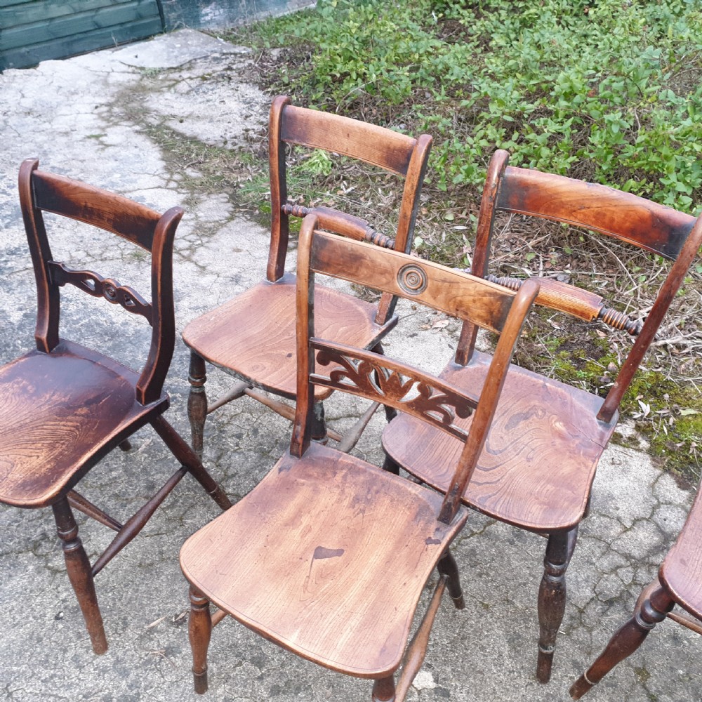 Harlequin set of 8 19th century Windsor farmhouse kitchen chairs. View VIII