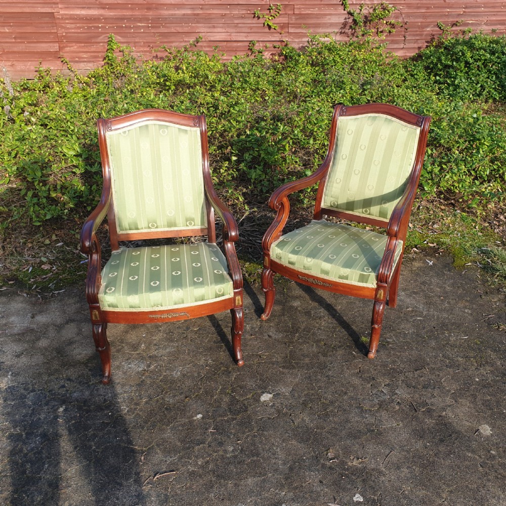 Pair of mahogany fauteuil with gilt metal mounts. 